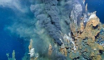 Mineral-laden water emerging from a hydrothermal vent